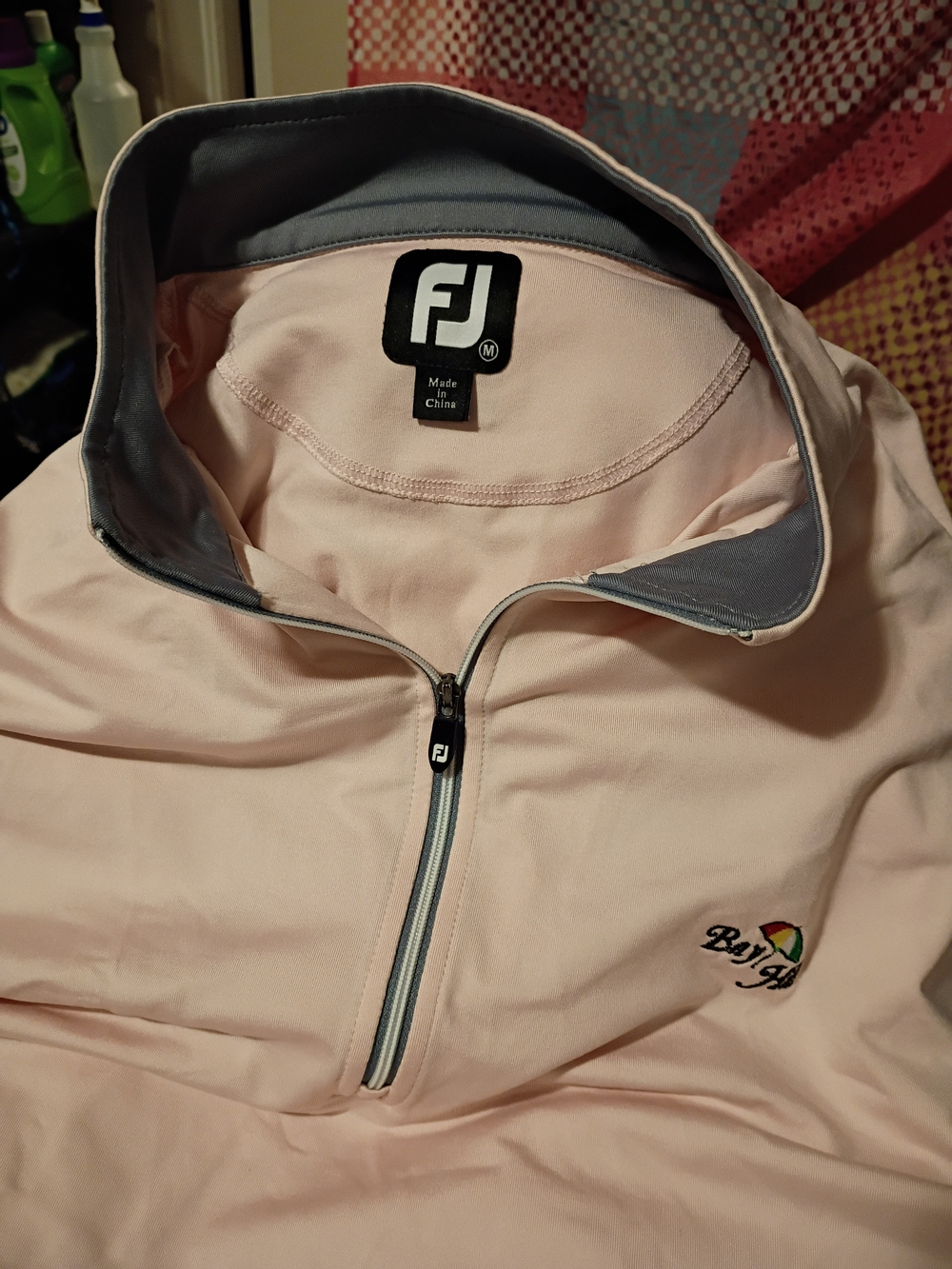 FootJoy Women's Pink Half-Zip Golf Jacket.